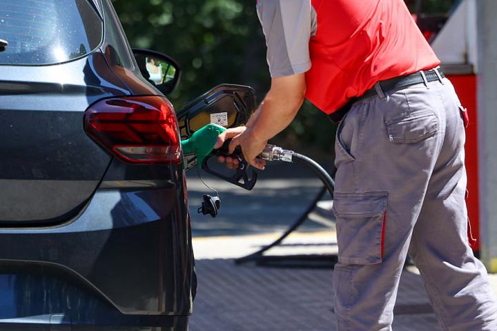 MADRID, SPAIN - JULY 01: A person is filling up a car with petrol at a petrol station on 1 July 2026 in Madrid, Spain. The CNMC (National Commission for Markets and Competition) is today publishing a list of petrol stations that are taking advantage of state aid to increase their profits, with the aim that this “public naming and shaming” will also serve as a basis for consumers to lodge complaints under the reform of Royal Decree-Law 7/2026, which comes into force today and was approved by the Council of Ministers to tighten control over the fuel market. (Photo By Marta Fernandez/Europa Press via Getty Images)