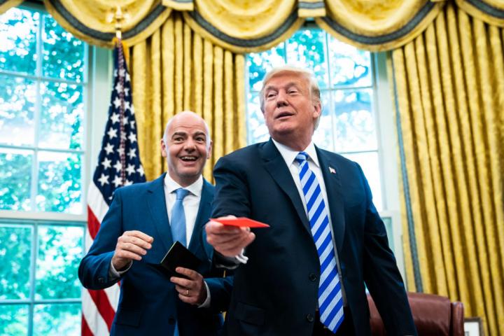 WASHINGTON, DC - AUGUST 28 : President Donald J. Trump is given a red card by FIFA President Gianni Infantino during a meeting in the Oval Office of the White House on Tuesday, Aug 28, 2018 in Washington, DC. (Photo by Jabin Botsford/The Washington Post via Getty Images)