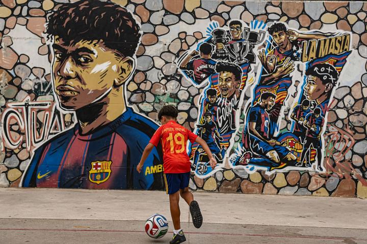 SPAIN - JULY 19: Supporters of the Spanish national team during the 2026 World Cup final, in the Rocafonda neighbourhood, on 19 July, 2026 in Mataro, Barcelona, Catalonia, Spain. Spanish national team striker Lamine Yamal grew up in the Rocafonda neighbourhood of Mataro. The match pits Spain against Argentina in the World Cup final to decide who will lift the trophy. The Spanish side are contesting their second final in their history, whilst the Argentinians are back in the final this year after reaching the final of the 2022 World Cup in Qatar, from which they emerged as champions. (Photo By Alberto Paredes/Europa Press via Getty Images)