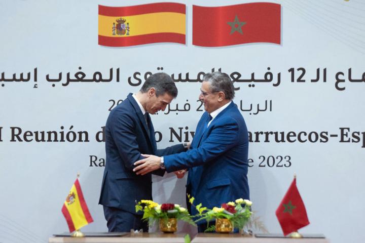 RABAT, MOROCCO - FEBRUARY 02: The President of the Government, Pedro Sanchez (left) and the Head of Government of the Kingdom of Morocco, Aziz Akhannouch (right), shake hands during the signing of agreements after the plenary meeting of the XII Morocco-Spain High Level Meeting, at the headquarters of the Moroccan Ministry of Foreign Affairs, on 02 February, 2023 in Rabat, Morocco. Today took place the second day of the XII Morocco-Spain High Level Meeting, which began yesterday, February 1 and ends today. The Spanish Government has no hesitation in describing the meeting as historic, which comes after eight years without a High Level Meeting (HLM), and praises the progress made in the last year, after the Executive endorsed the Moroccan autonomy plan for the Sahara. This meeting is expected to lay a solid foundation in the relationship between Spain and Morocco that will allow the recurrent crises between the two countries to be forgotten, even if there will not be a meeting between Pedro Sanchez and King Mohamed VI. (Photo By David Zorrakino/Europa Press via Getty Images)