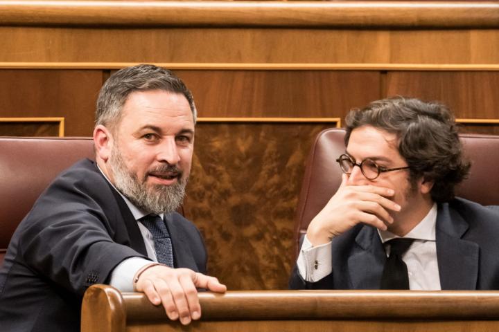 MADRID, SPAIN - DECEMBER 19: The leader of Vox, Santiago Abascal (left), and the secretary general of the VOX Parliamentary Group, Jose Maria Figaredo (right), during a plenary session in the Congress of Deputies, on 19 December, 2023 in Madrid, Spain. The Plenary of the Congress is scheduled to debate next January 9, in an extraordinary session, the amendments of totality to the Amnesty Bill announced by the PP and Vox. Once they are rejected, the law will be debated firstly in the conference and then in the Justice Commission, with the aim of returning to the Plenary at the end of January, so that the Senate can have it on its table in February. (Photo By Diego Radames/Europa Press via Getty Images)