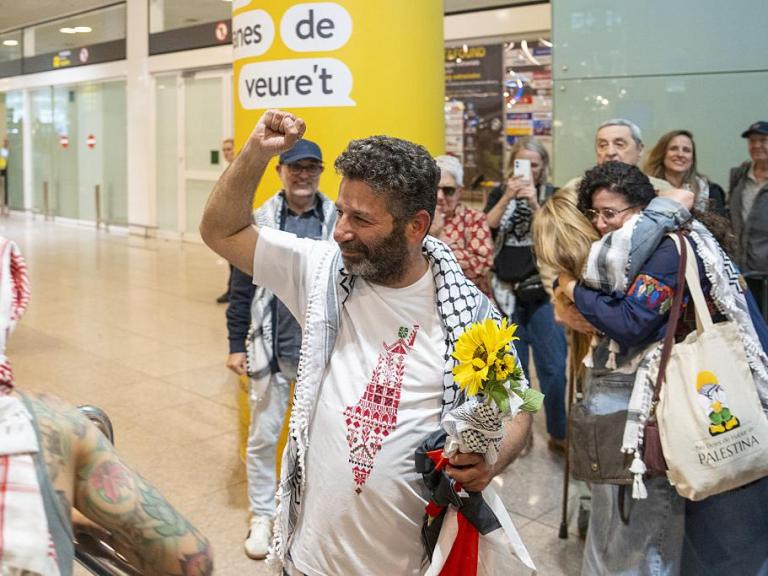 BARCELONA, SPAIN - MAY 10: Activist Saif Abukeshek returns to Barcelona-El Prat Airport after being released by Israel following his detention during the interception of the Global Sumud Flotilla in international waters, in Barcelona, Spain on May 10, 2026. Abukeshek, a Palestinian origin activist with Spanish and Swedish nationality, spent ten days in Shikma prison in Ashkelon after being detained on April 30 alongside Brazilian activist Thiago Avila. Abukeshek said he planned to travel to Turkiye in the coming days to rejoin other flotilla activists preparing further initiatives. (Photo by Lorena Sopena Lopez/Anadolu via Getty Images)