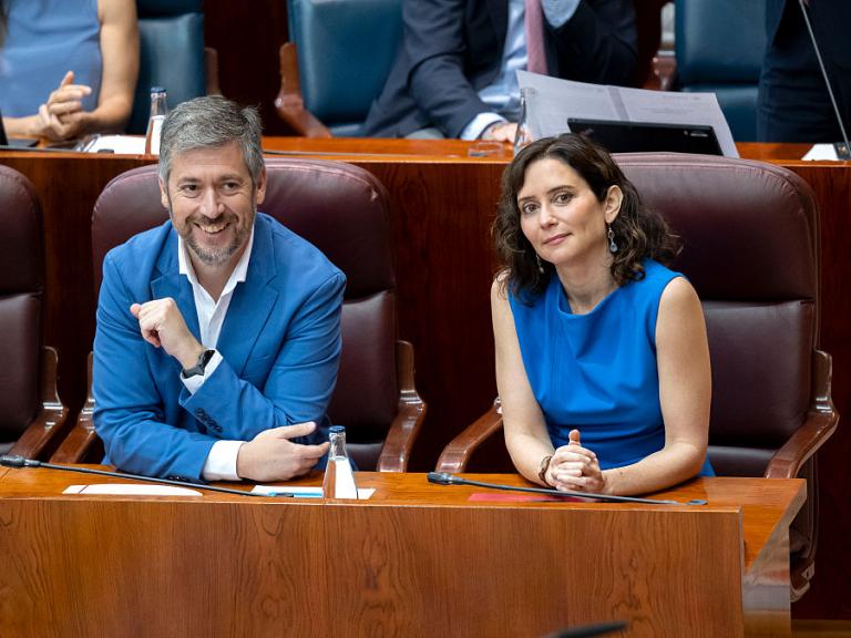 SPAIN - JUNE 11: The Regional Minister of the Presidency, Justice and Local Administration, and spokesperson for the regional government, Miguel Angel Garcia Martin, and the President of the Community of Madrid, Isabel Diaz Ayuso, during a plenary session of the Assembly of Madrid, on 11 June, 2026 in Madrid, Spain. The Assembly of Madrid approves the reform of the Rules of Procedure of the Chamber to introduce the legislative footprint and regulatory traceability, in a session that still echoes the recent visit of Pope Leo XIV to the region. (Photo By Alberto Ortega/Europa Press via Getty Images)