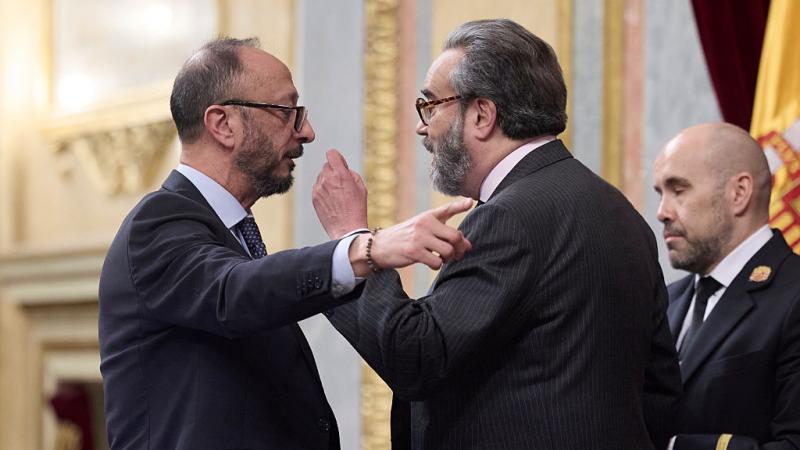 MADRID, SPAIN - APRIL 14: The first vice-president of Congress, Alfonso Rodriguez de Celis (left), and Vox deputy Carlos Flores Juberias (right), during the plenary session of the Congress of Deputies, on 14 April, 2026 in Madrid, Spain. The plenary session will deal with two bills (integral veil and digital CNMC), two PNL on victims of the Patronato and bibliocausto, a PP motion on railway infrastructures, interpellations and questions to the Government on war, taxation, energy, regional funding and management, as well as four international agreements on visas, diplomacy and electricity. (Photo By Jesus Hellin/Europa Press via Getty Images)