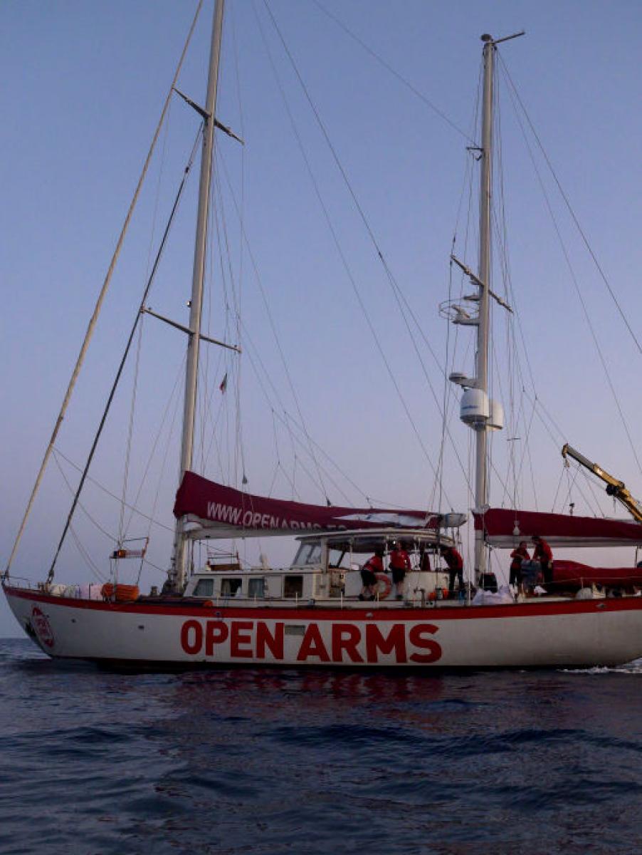 ITALY - 2022/05/18: The sailing boat Astral seen in SAR Zone. The crew of Astral sailboat, of the Spanish NGO Open Arms, carried out a rescue for nearly 70 women and men in Italian Sar Zone. The Italian Coast Guard (Guardia Costiera Italiana) arrived to take people on board. (Photo by Valeria Ferraro/SOPA Images/LightRocket via Getty Images)