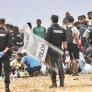 Vuelven a desalojar a más de mil migrantes de la playa de El Trampolín, en Ceuta