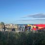 La Policía carga contra manifestantes en Ceuta tras quemar asentamientos de migrantes en la playa